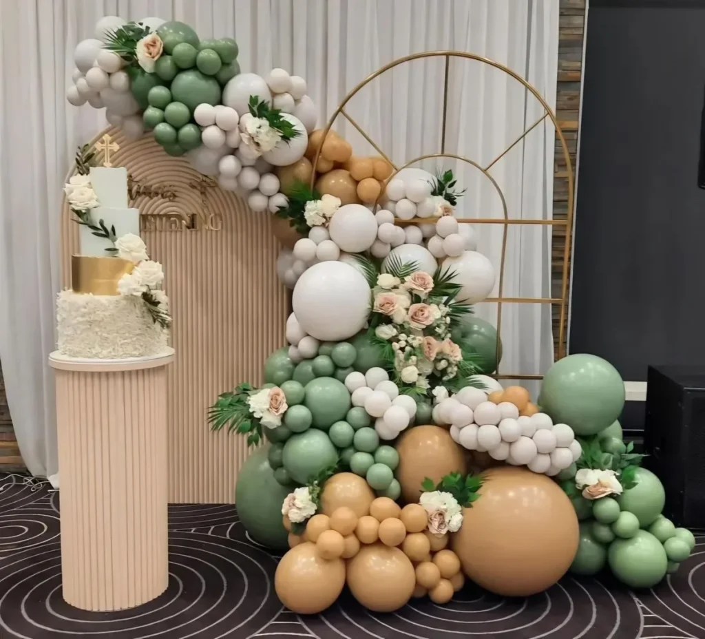 Sage and nude celebration with roses by JM Balloons and Beyond